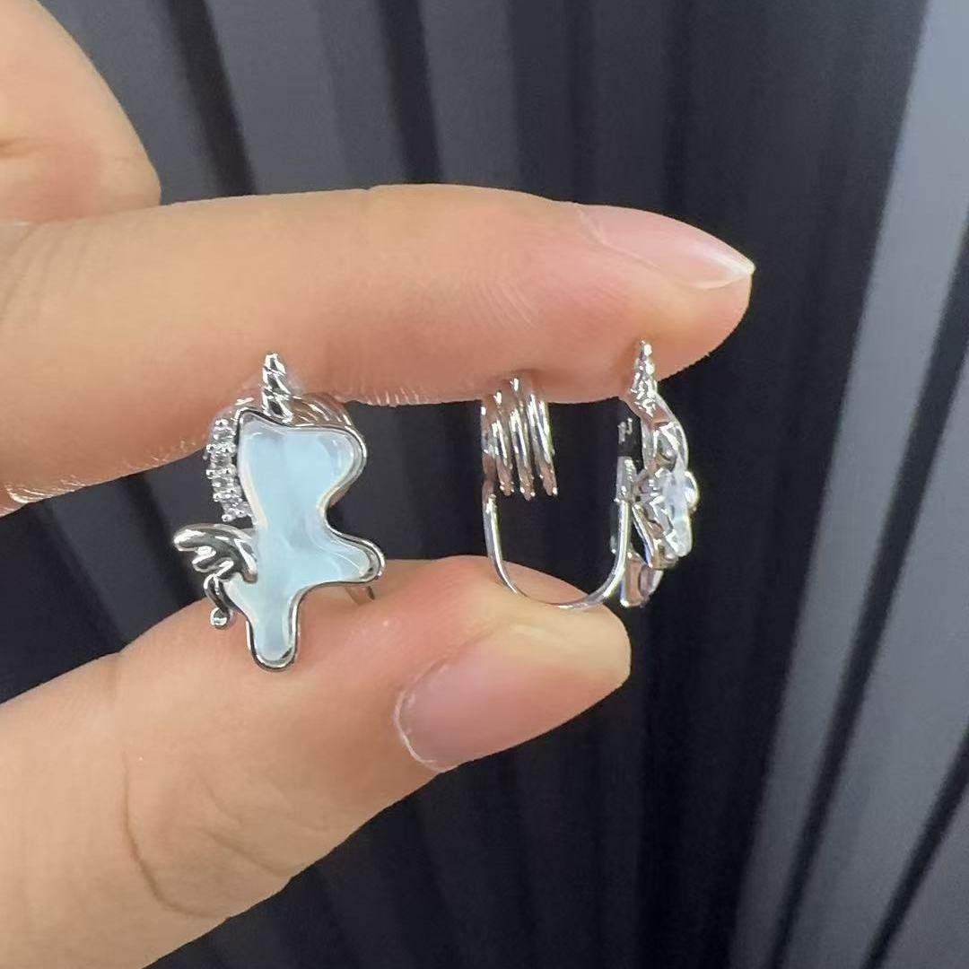 Pendientes de clip Xuping de aleación de cobre con baño de plata, diseño elegante y exclusivo, aretes graciosos y dinámicos para mujeres sin perforaciones en las orejas.