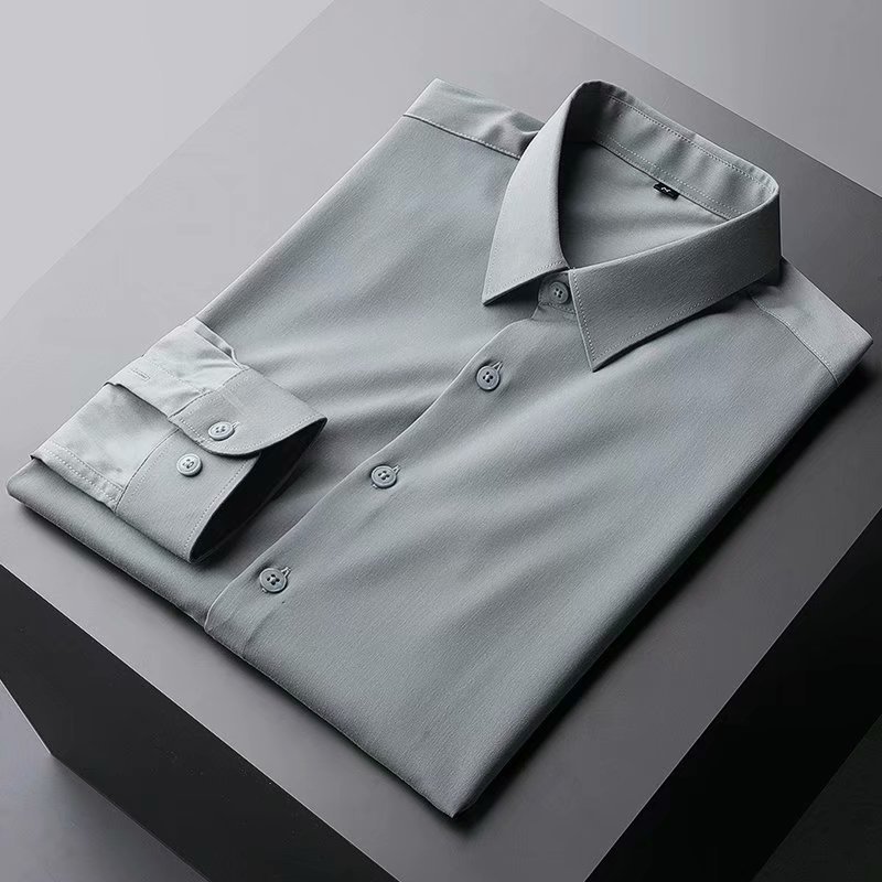 Camisa de manga larga de color sólido estilo coreano de los hombres de Moda Ropa superior casual diseño sentido ins marca de moda camisa suelta y guapo