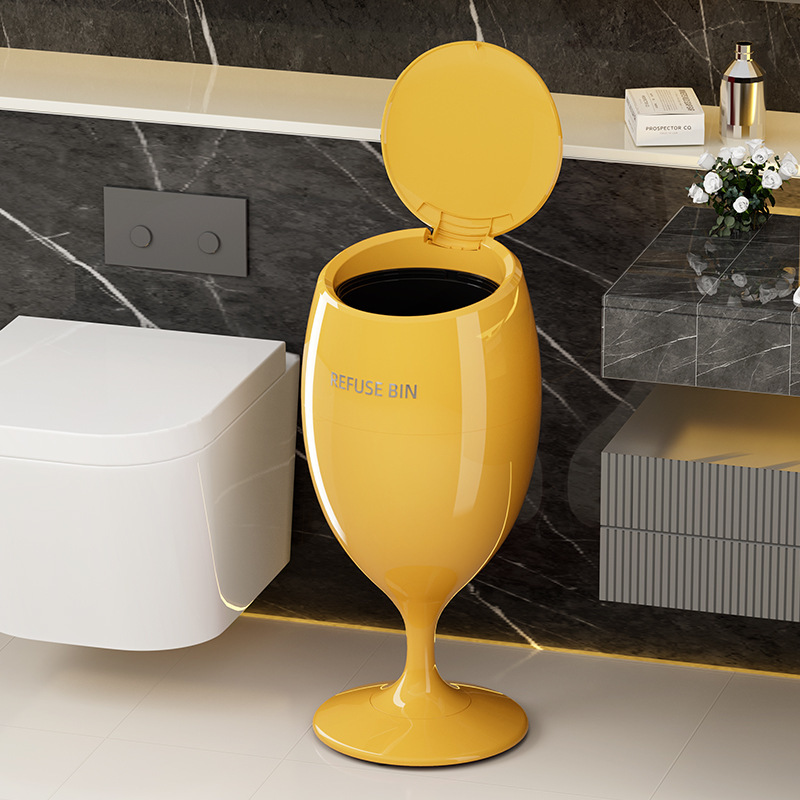 Trash bin in the shape of a wine glass for home use in the living room, with a luxurious and attractive design, featuring a press-open lid, removable, and large capacity