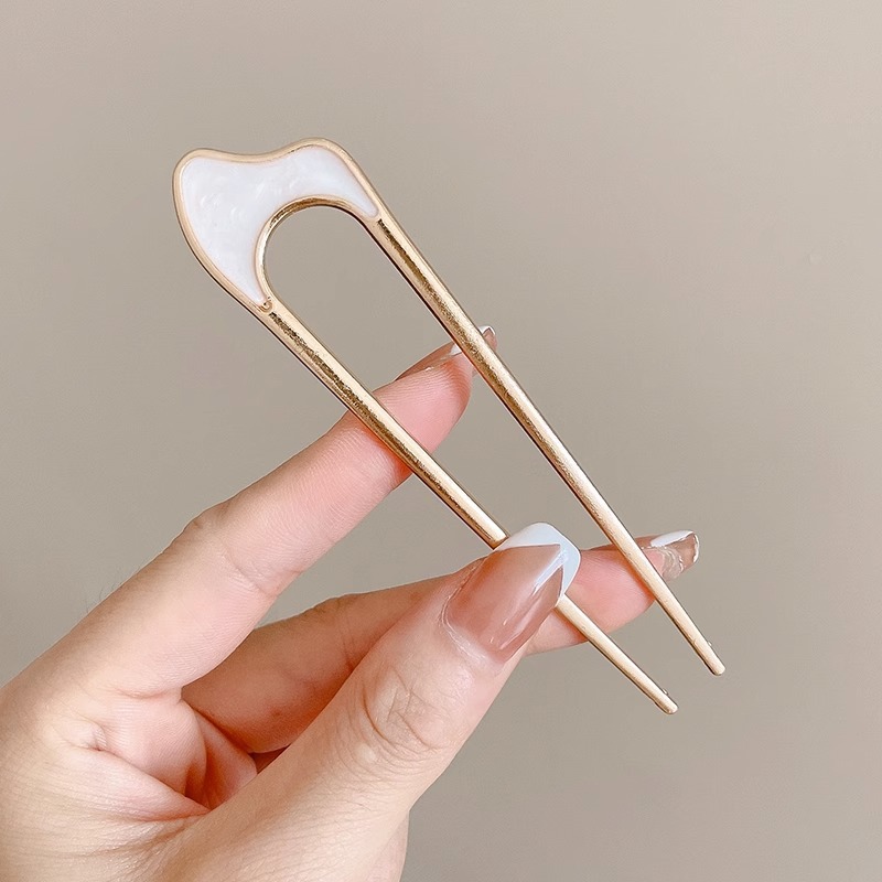 Cuatro dientes enchufe de cabello para mujer 2025 nuevo tipo de cabeza de bola fijación en forma de U enchufe de cabello de alta calidad enchufe de cabello