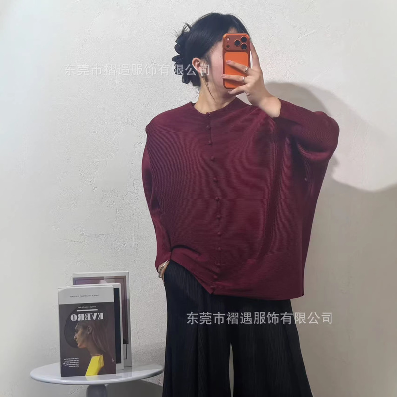 Miyake's Loose and Simple Design Cardigan with Thirteen Buttons and Pleated Details Miyake's Loose and Simple Design Cardigan with Thirteen Buttons and Pleated Details