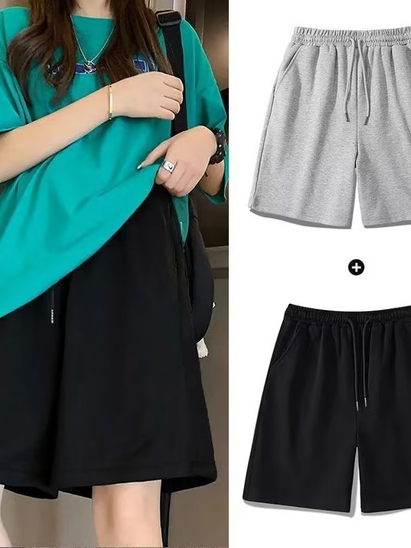 Pantalones de moda para hombres, pantalones casuales coreanos sueltos, versátiles, cinco puntos, pantalones de playa de nuevo tamaño grande de verano