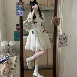 夏季收腰森系白色泡泡袖蝴蝶结连衣裙少女设计感小众初恋风短裙子