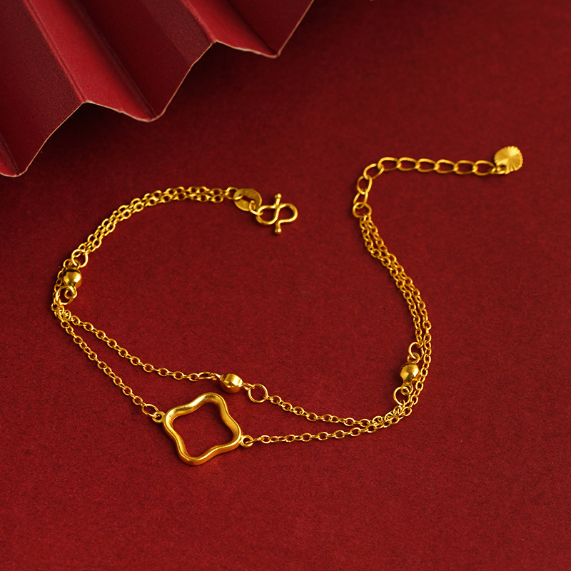 Aleación de cobre de Cercanías de moda todo partido pulsera de doble capa trébol de cuatro hojas pulsera de doble línea joyería de suministro directo de fábrica de las mujeres