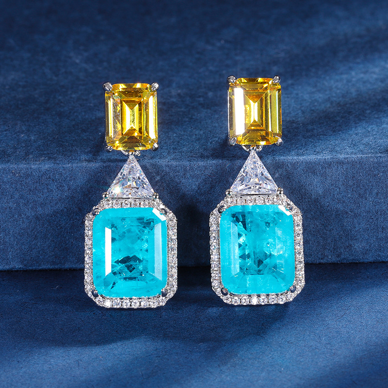 Zhuang sheng joyas de cobre inferior chapado en oro de simulación de moda esmeralda palaiba de dos colores de piedra principal traje de temperamento de las mujeres