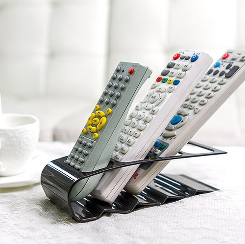 Super practical four-compartment electrical appliance remote control storage rack for home plastic remote control rack 8069