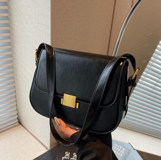 Alta sensación retro simple bolso cuadrado para mujeres 2024 nuevo estilo universal bolso de hombro de estilo extranjero bolso de brazo de viaje de moda