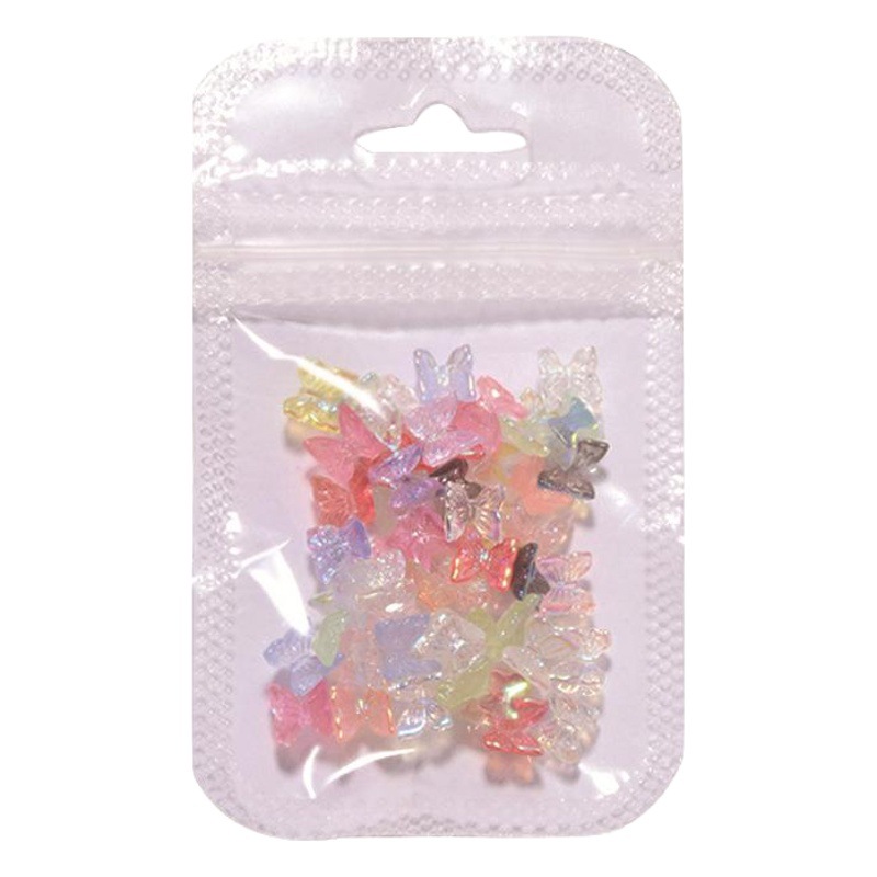 50 fábrica al por mayor uñas Red Butterfly Libro rojo con el mismo tipo de resina color hielo mezclado Aurora pequeña mariposa