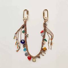 クロスボーダー新 Freepeople ファッション個性悪魔の目メタル幾何学的な愛のペンダント織りキー