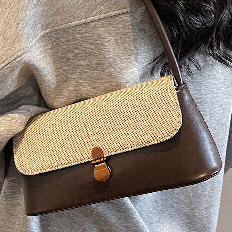 Retro nicho de viaje bolsos de brazo bolsos de mujer 2026 primavera bolsos de hombro diarios de moda bolsos de mano de alto valor