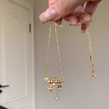 小红书爆款拉丝鸢尾花星芒黄水吊坠别针项链中古感锁骨链一件代发