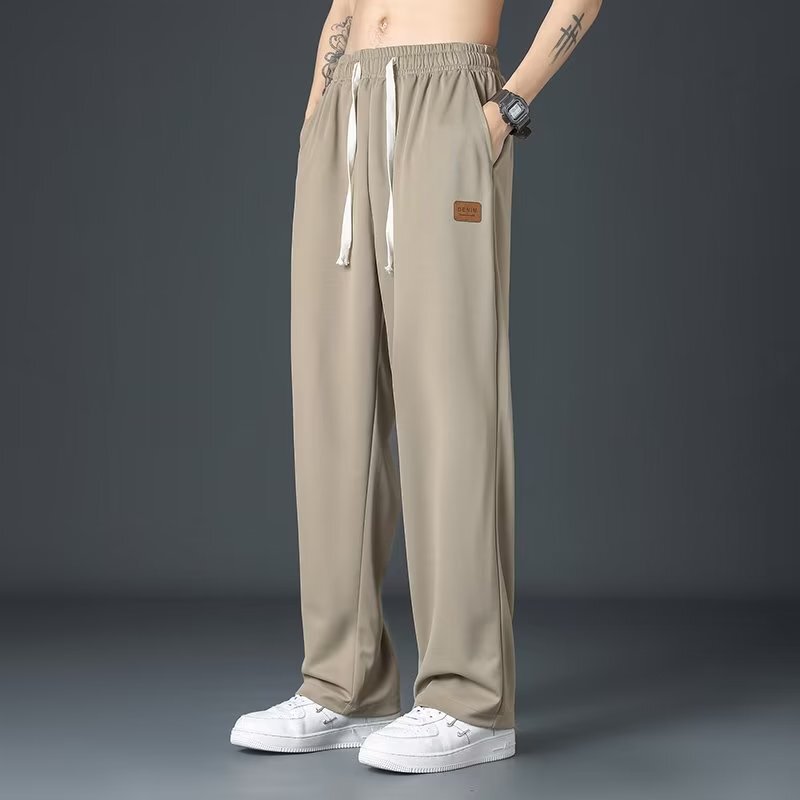 シャツの少ない服装の氷のズボンの夏の新型の香港風のゆったりした大きいサイズのストレートの広腿のズボンの垂れ感の薄いタイプのカジュアルなズボン|undefined