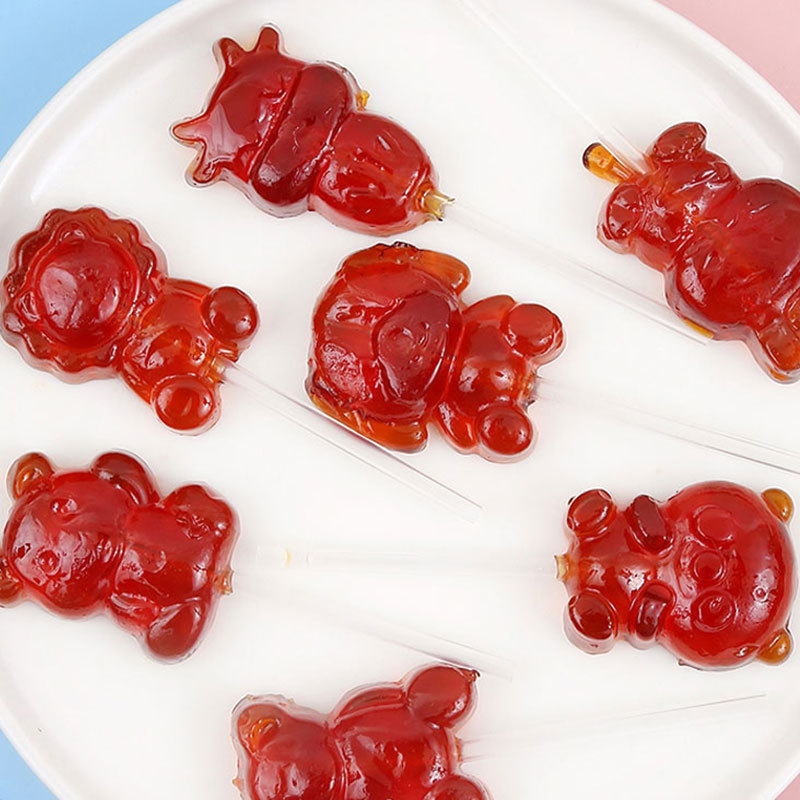 ブルーベリーの葉の黄素のグミのロリポップの源の工場は代行して爆発の子供の間食のブルーベリーのグミのロリポップの棒を作ります。|undefined