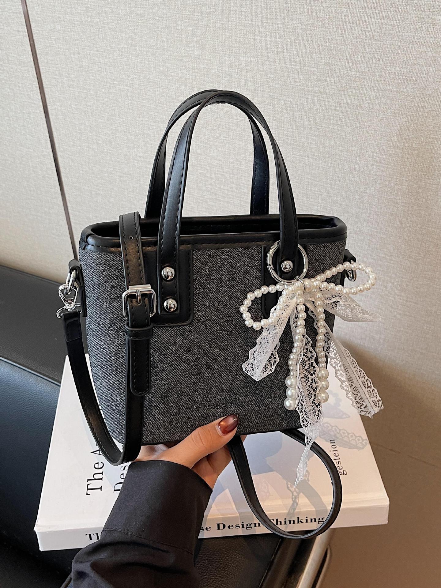 Bolso de cubo de mano de estilo occidental de moda para mujer 2025 nuevo bolso de hombro de todo fósforo de color de contraste bolso de mensajero de viaje de textura de moda