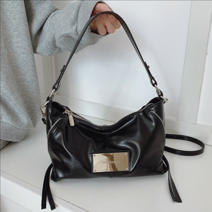 Transfronterizos suaves retro bolsas de brazo portátiles mujeres otoño y invierno 2025 nueva moda versátil bolsas de hombro bolsas de transporte