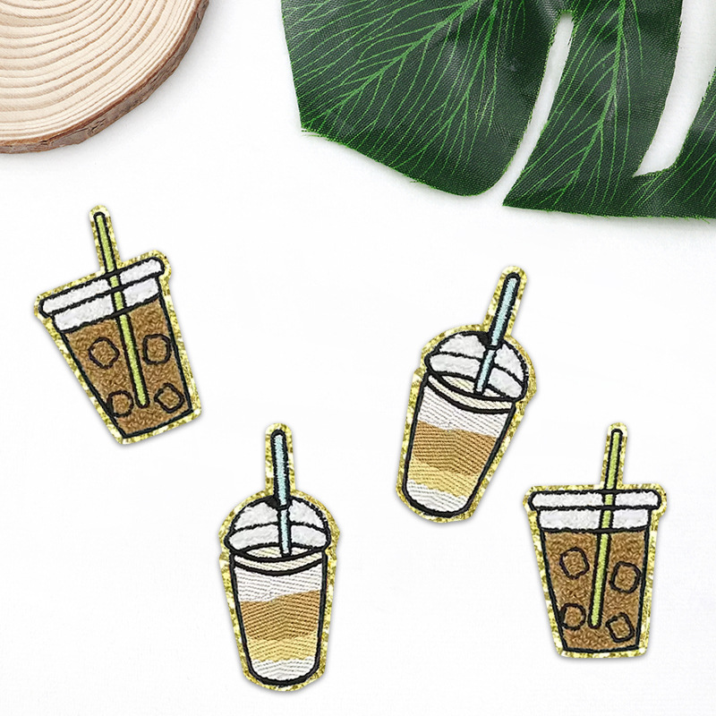 东莞刺绣工厂奶茶饮料杯子图案装饰毛巾绣背胶刺绣贴布贴补丁布贴