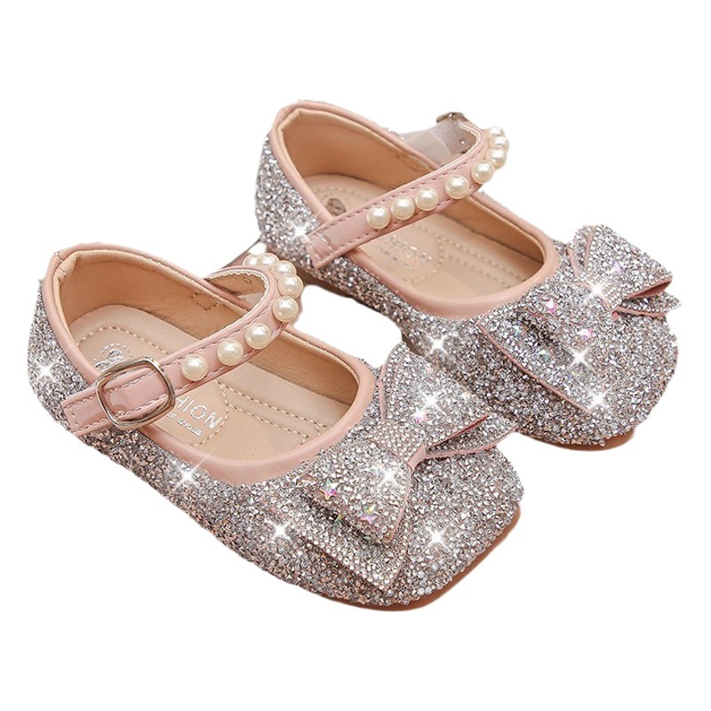 Zapatos de cuero para niñas con lazo de diamantes de imitación, zapatos de princesa para niñas, nuevo modelo 2026, zapatos infantiles de suela blanda, zapatos de cristal elegantes, a la moda.