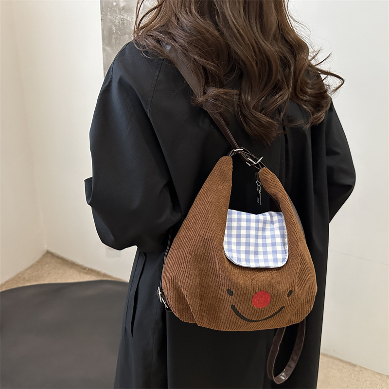 Vintage velcro nariz roja sonriente bolso de mano para mujeres otoño y invierno 2024 gran capacidad mochila de viaje mochila