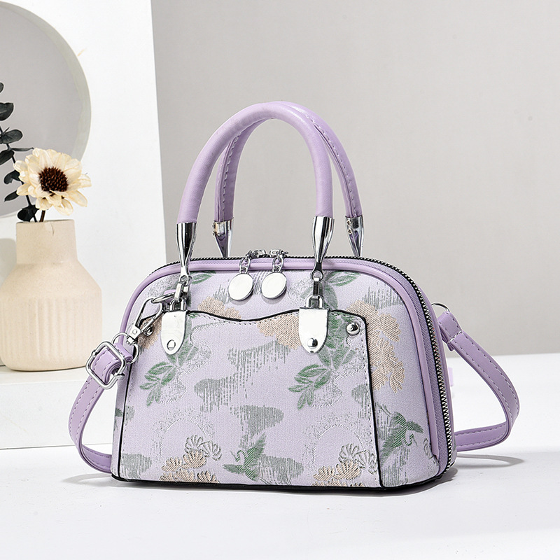 Fabricantes de bolsos de mujer bolsos de mano atmósfera textura bolsos de hombro de gran capacidad bolsos de mochilas bolsos de comercio exterior