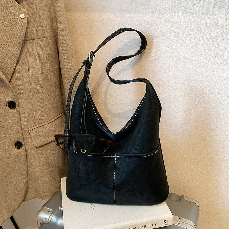 Cross-border backpack, bolsas de mano, bolsas de cubo, bolsas de gran capacidad, bolsas de hombro casuales para mujeres.