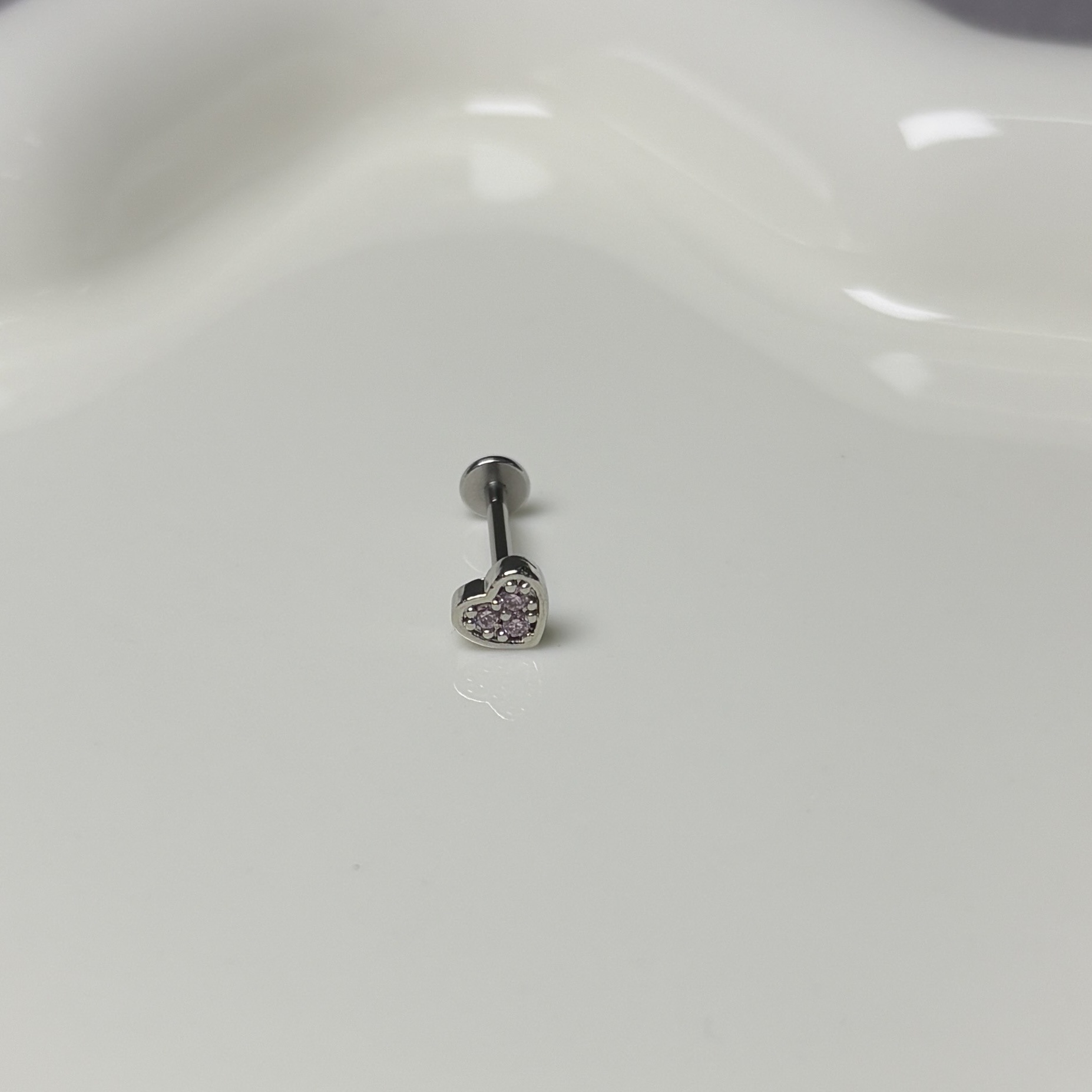 Pointed labret stud close-up product detail