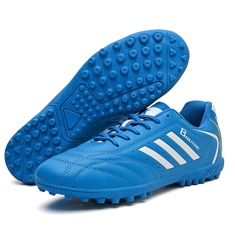 Zapatos de fútbol en stock, zapatos de entrenamiento anti-deslizante para niños, respirados y amortiguados, zapatos de entrenamiento juvenil