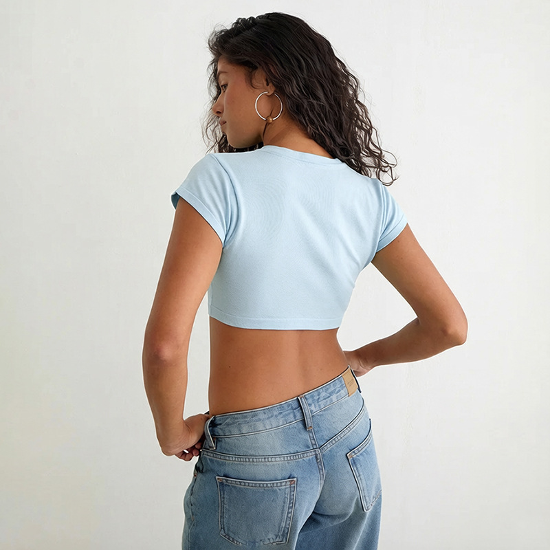 2026 nuevo verano de estilo europeo y americano ropa de mujer transfronteriza tendencia de color sólido botón de punto empalmado blusa corta image 3