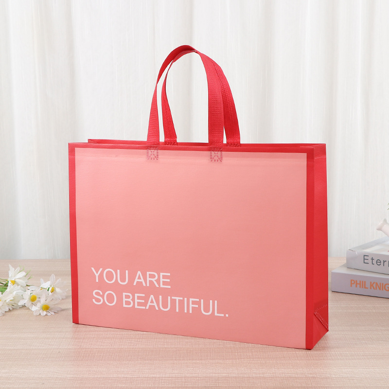 Bolsa de mano no tejida colorida ropa zapatos necesidades diarias bolsa de compras de gran capacidad almacenamiento bolsa de tela no tejida portátil