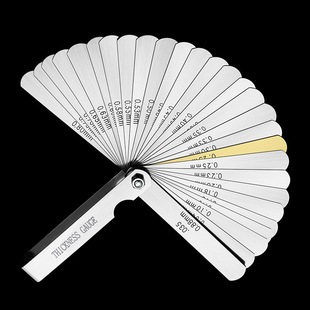 Combination feeler gauge 32-piece clip copper inch. 0015-.035in metric 0.04-0.88mm gap thickness measurement