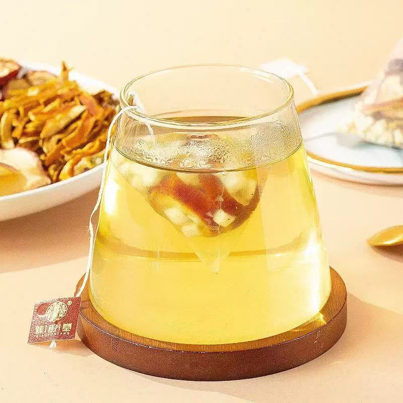 Apple Tangerine Peel Four Spirits Soup Tea Chen Pi Si Shen Tang 30 Bags 5g Each Daily Wellness Brew in use