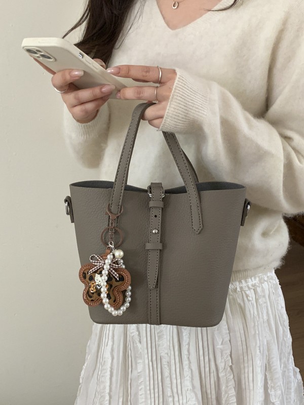 Nicho coreano canasta de platos portátiles bolsos de cubo para mujeres 2026 ventas calientes nuevas bolsas de hombro casuales de gran capacidad