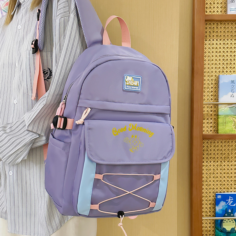 Mochila de estilo universitario de color de contraste lindo mujer 2025 nueva mochila de estilo crema casual campus escuela secundaria escuela secundaria