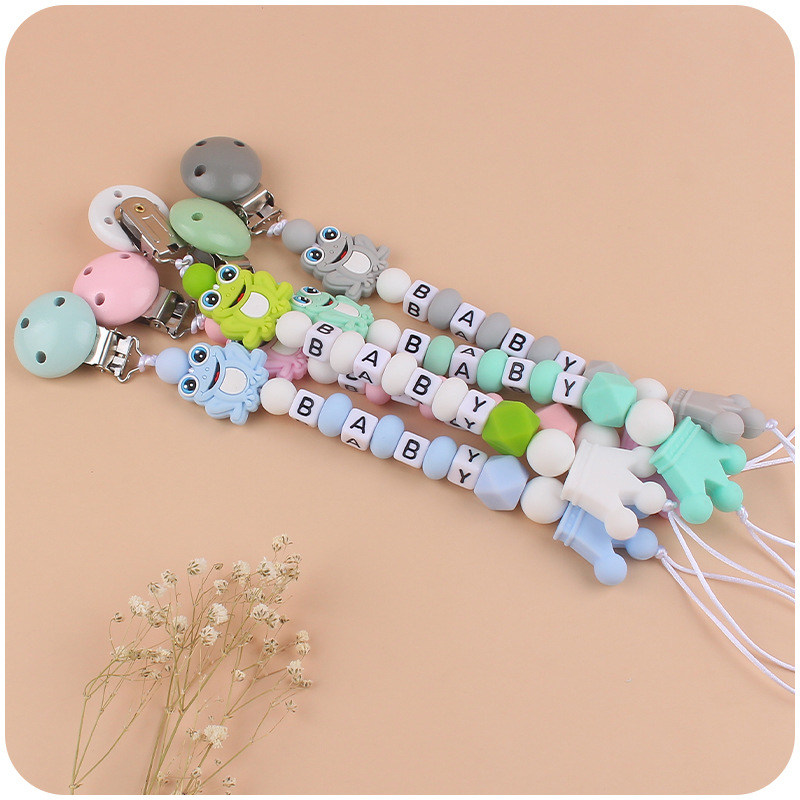 Suministros para bebés de dibujos animados animal Rana mordedor chupete cadena calmante bebé DIY mordedura de silicona chupete cadena anti-gota