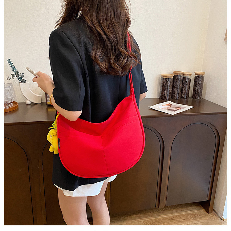 Simple solid-color canvas bag 2024 new style Japanese large-capacity single-shoulder dumpling bag, versatile for school and commuting crossbody bag undefined