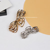 Golden shark with bow, crab pin, hairgrip, hair accessory, simple and elegant design, new collection