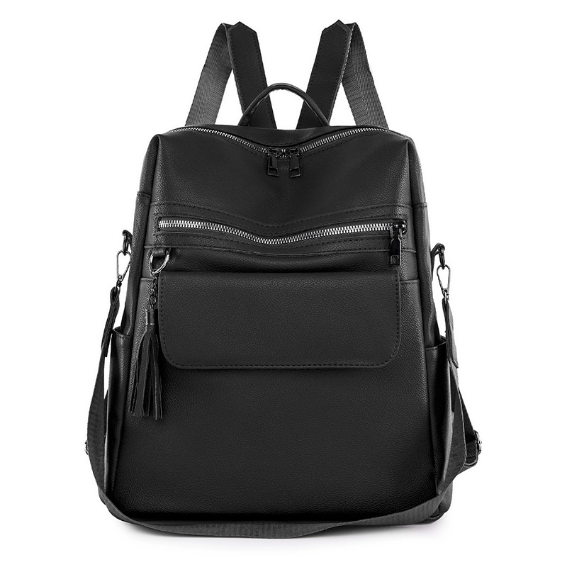 2024 nueva mochila de PU de moda casual para mujer, borla de moda, mochila de viaje de color sólido de gran capacidad al por mayor