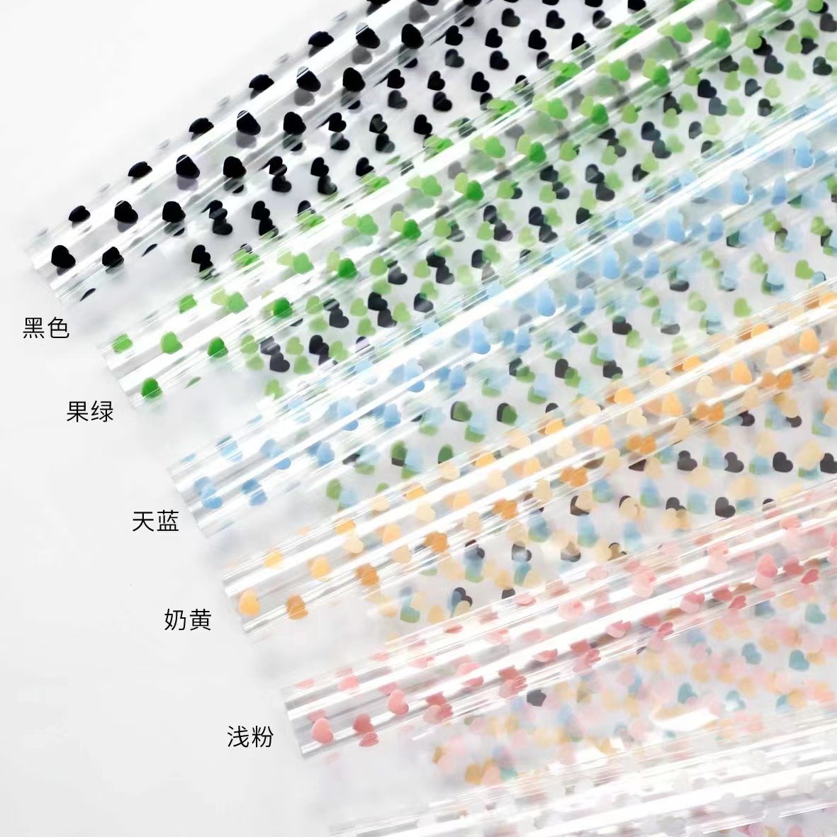 Fábrica de fiestas de flores al por mayor nuevos productos de impresión de amor de papel de vidrio flor de embalaje de flores transparente florista embalaje de papel