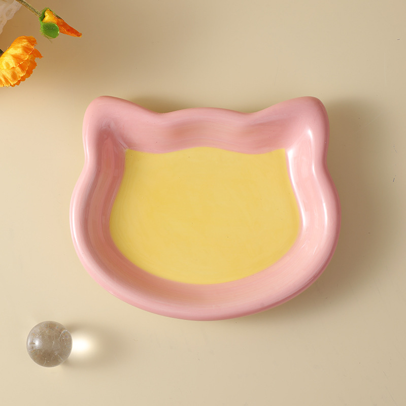 핑크 노란 고양이 얼굴