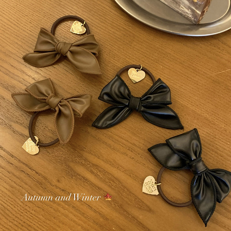 Women's Retro Bow Knot Pu Leather Hair Tie display picture 1