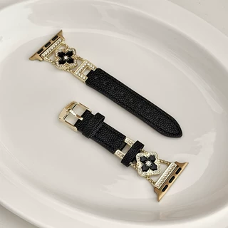 布契拉提拼皮质表带适用苹果iWatch11镶钻黑金四叶草苹果手表表带