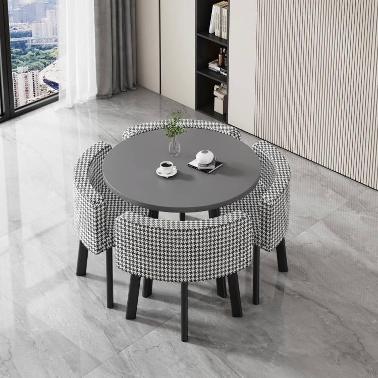 Gray round table + four houndstooth cloth chairs