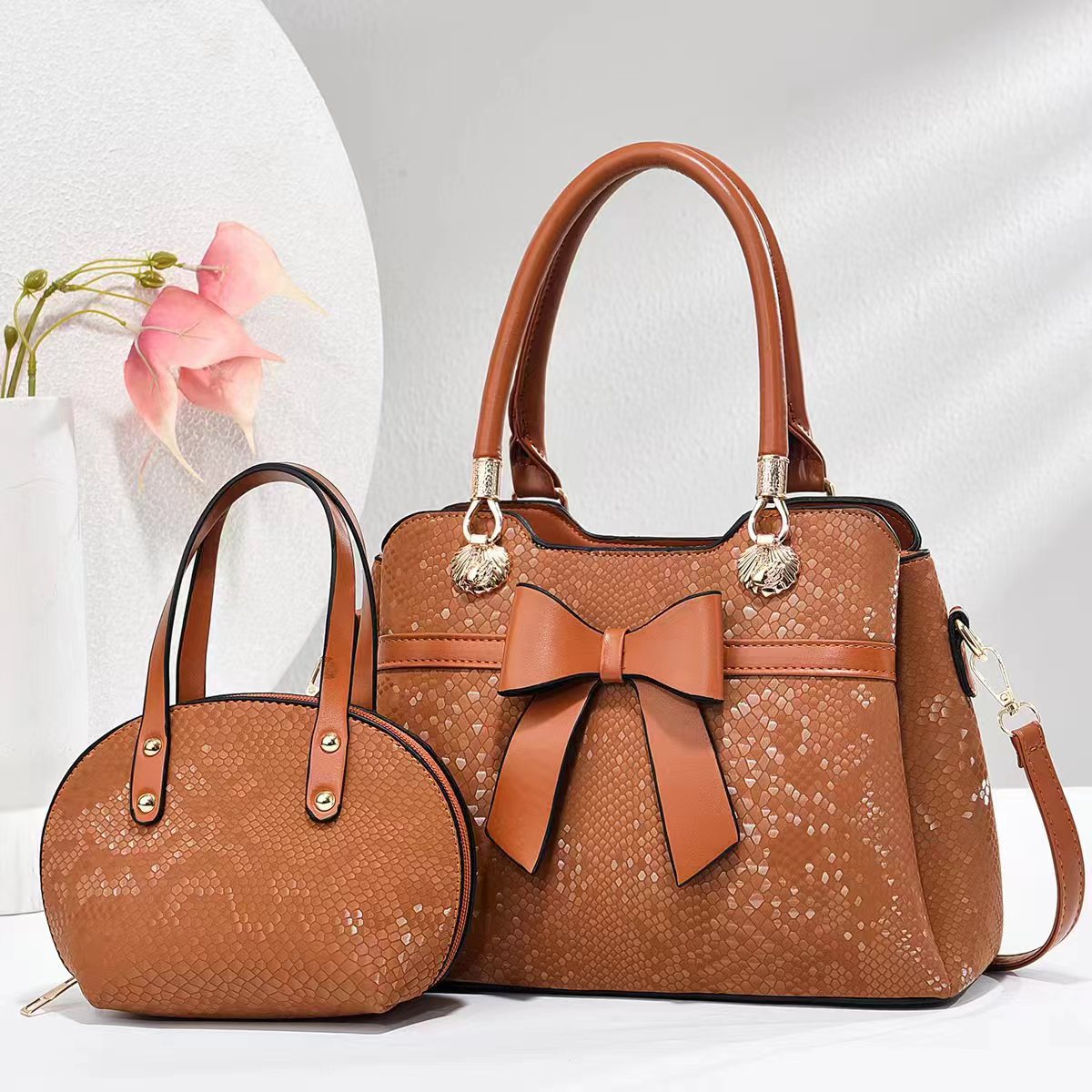 Bolso bolso bowknot bolso de madre e hijo patrón de serpiente bolso de mujer de comercio exterior textura bolso de mensajero de un solo hombro bags al por mayor transfronterizos