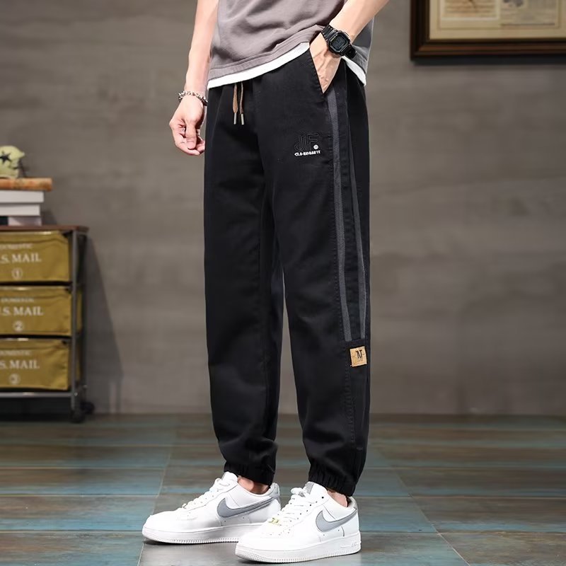 Pantalones casuales, marca de moda de otoño e invierno para hombres, pantalones bonitos, pantalones largos de Harlan de mezclilla de nuevo estilo, marea de gran tamaño para hombres