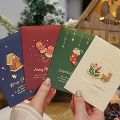 ニャンはクリスマスのグリーティングカードの復古的な平安夜のグリーティングカードのプレゼントカードの祝日の祝福のグリーティングカードのクリスマスの手書きカードを述べます。