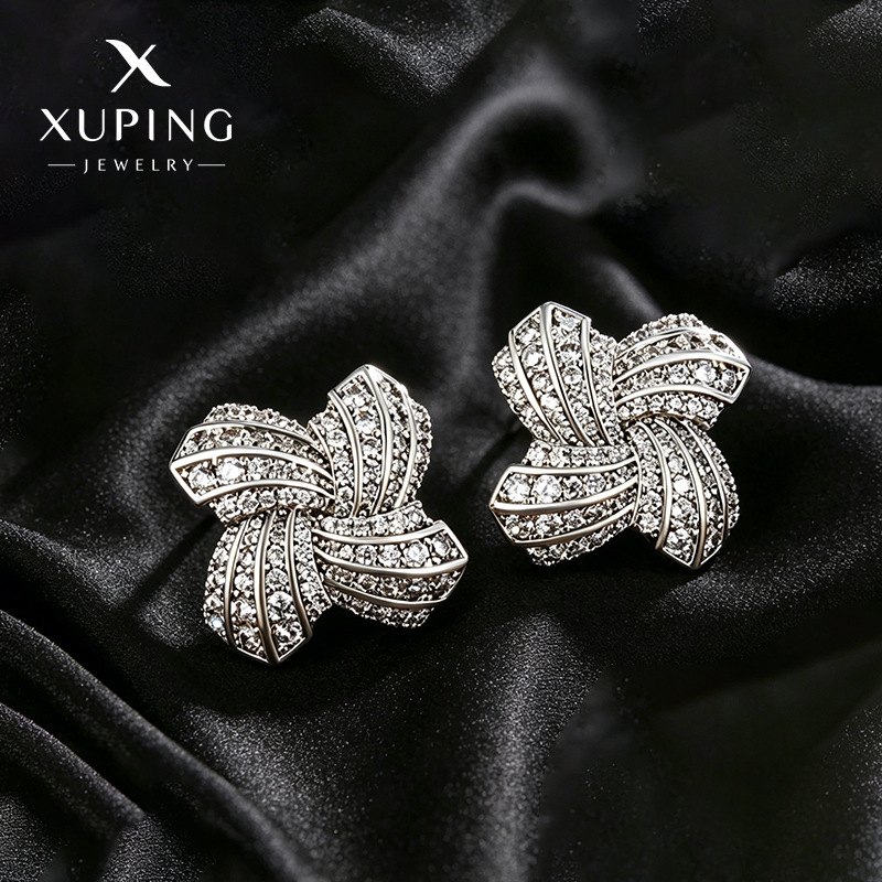 Xuping joyería aleación de cobre incrustación de piedras preciosas artificiales pernos de molino de viento mujer moda europea y americana pendientes de lujo ligero pernos