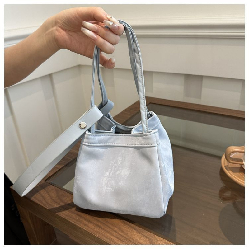 올해 인기있는 작은 가방 작은 디자인 한국 핑크 야채 바구니 가방 여성을위한 새로운 중국 스타일 올 매치 슬렁 버킷 가방