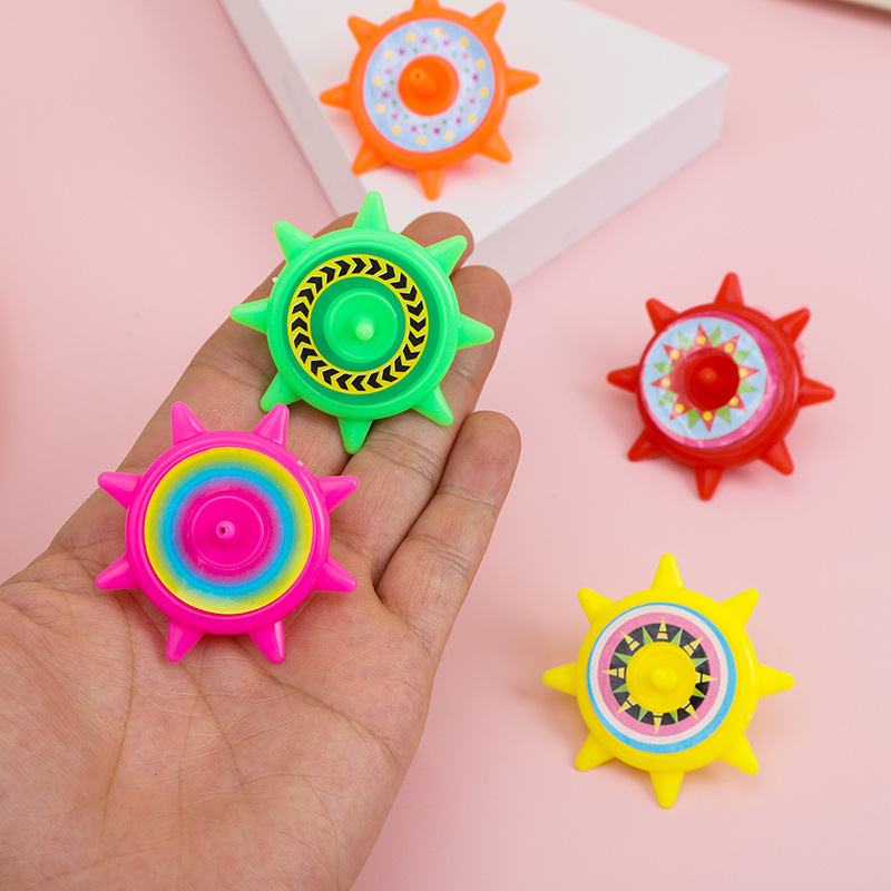 Yiwu fábrica de tierra octogonal torneado de plástico para niños pequeños juguetes niños y niñas mano torciendo pequeño gyro kindergarten regalo