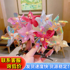 新商品の可愛い超萌えファッションのカラフルな風車のヘアピンの飾りは萌え小風車幼稚園のヘアピンの子供のおもちゃを売ります。