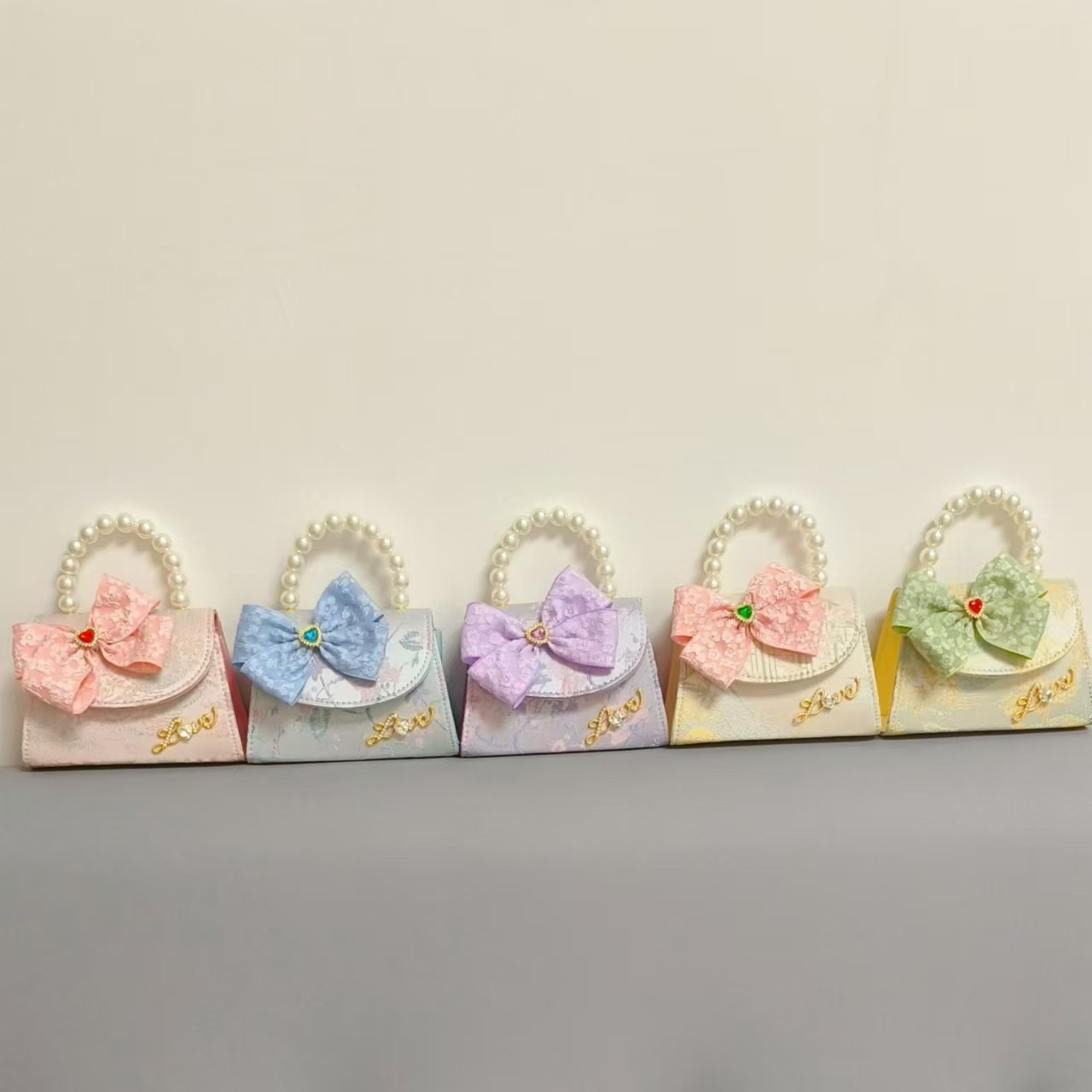 Guofeng bolso para niños, nuevo bolso de hombro de niñas, lindos bolsos de perlas de princesa, bolsos de arco, bolsos de mochila, bolsos pequeños