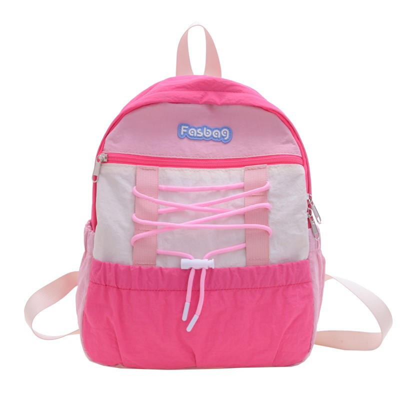 Mochila deportiva de ocio para niños y niñas, mochila de estudiantes de escuela primaria de gran capacidad de aire extranjero 2025 mochila infantil de cuerda de color contrastante